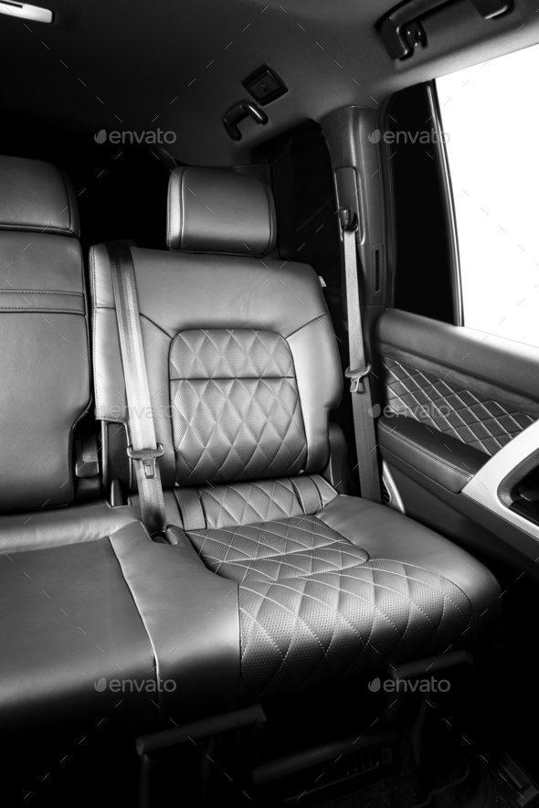 Back passenger seats in modern luxury car Stock Photo by gargantiopa
